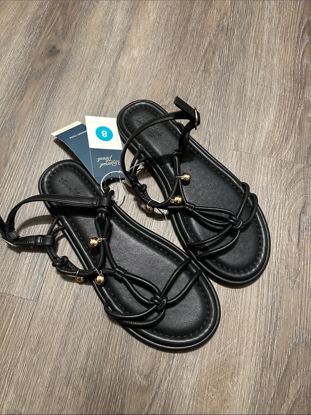 Women’s Black Knot Strappy Sandals with Gold Accents size 8